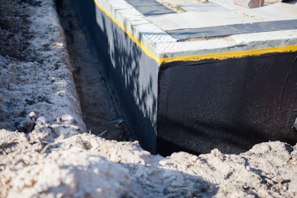Professional Waterproofing technician working in Greensburg, PA